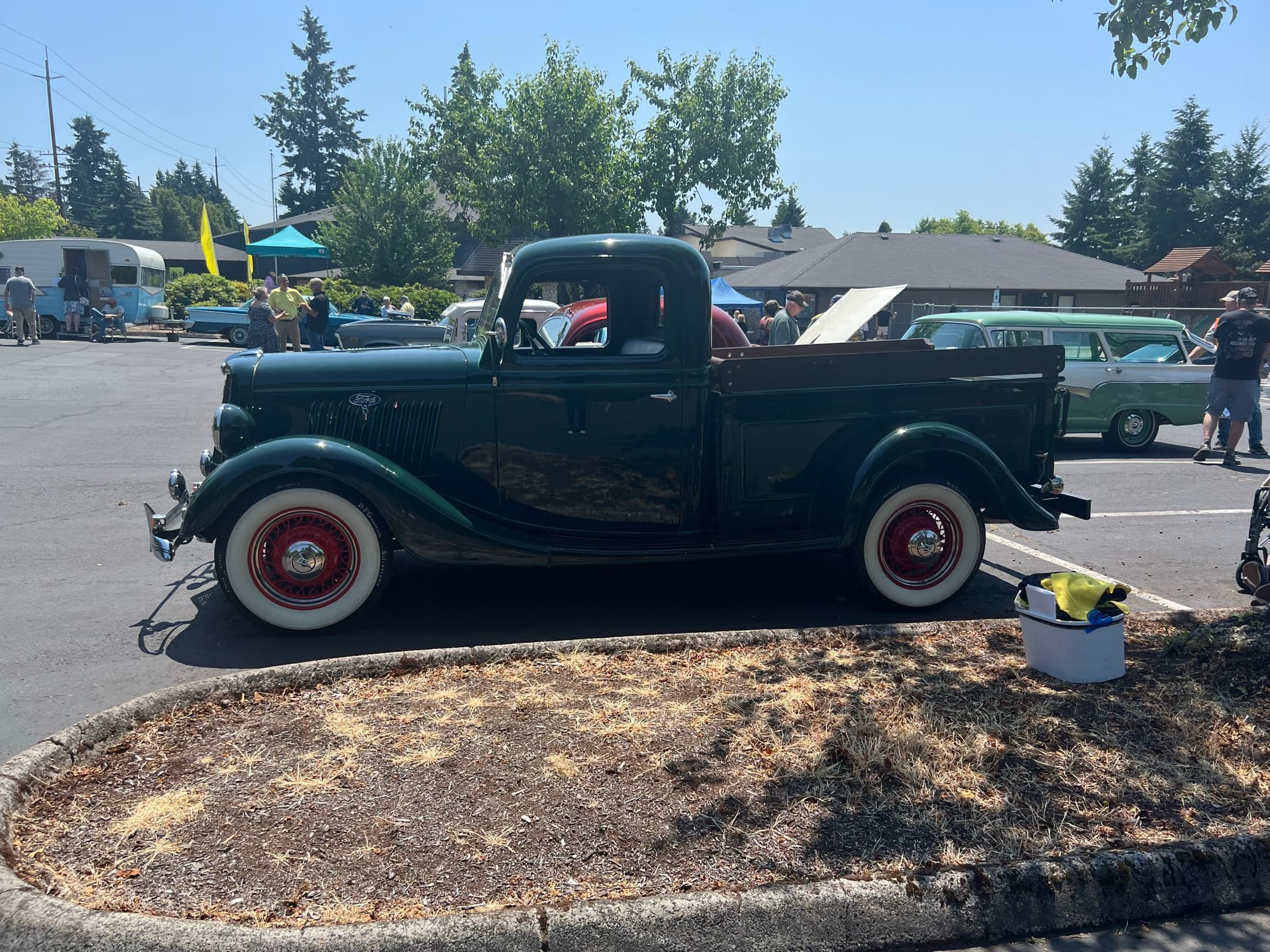 Black vintage pickup truck parked at Hot Rods and Dad Bods.